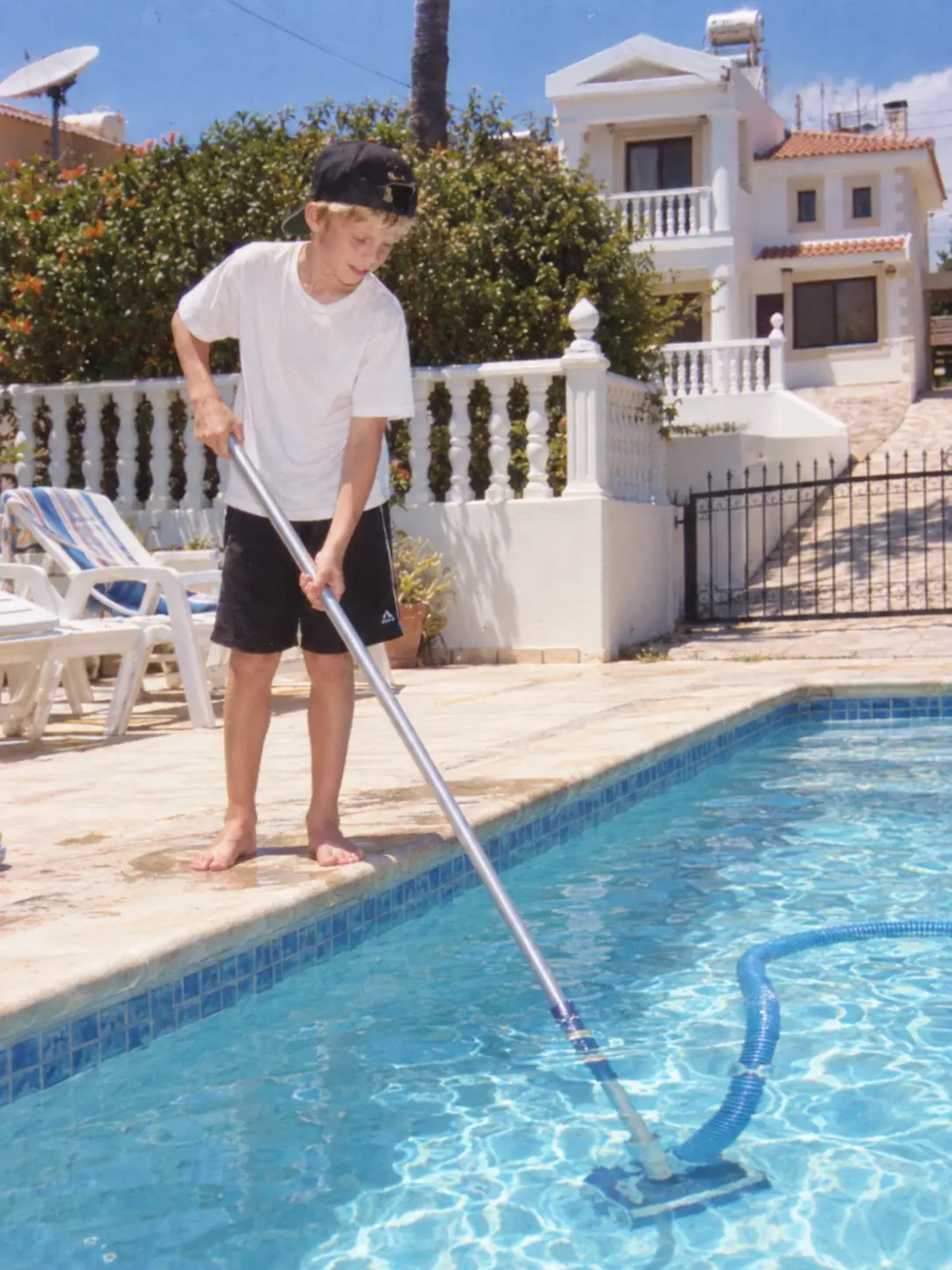 Recreated memory: a teenager cleaning a swimming pool